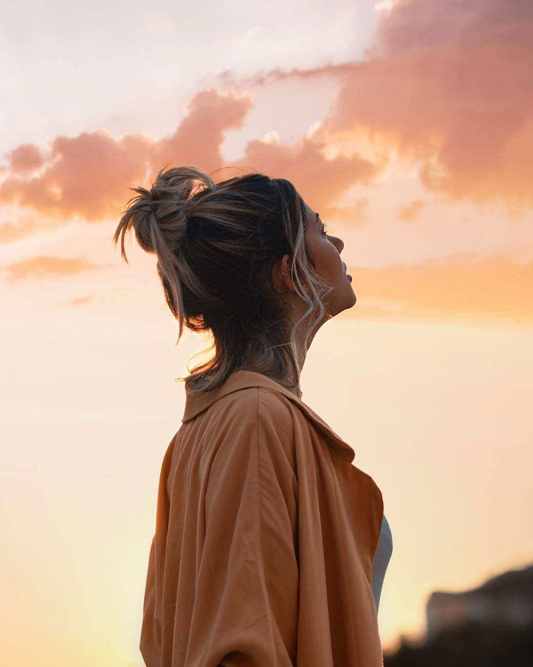 woman looking towards the sky