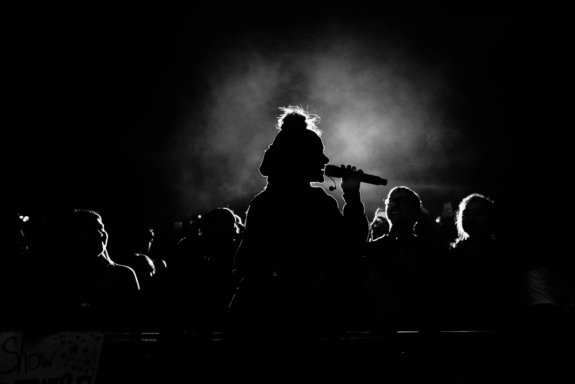 monochrome photo of person singing