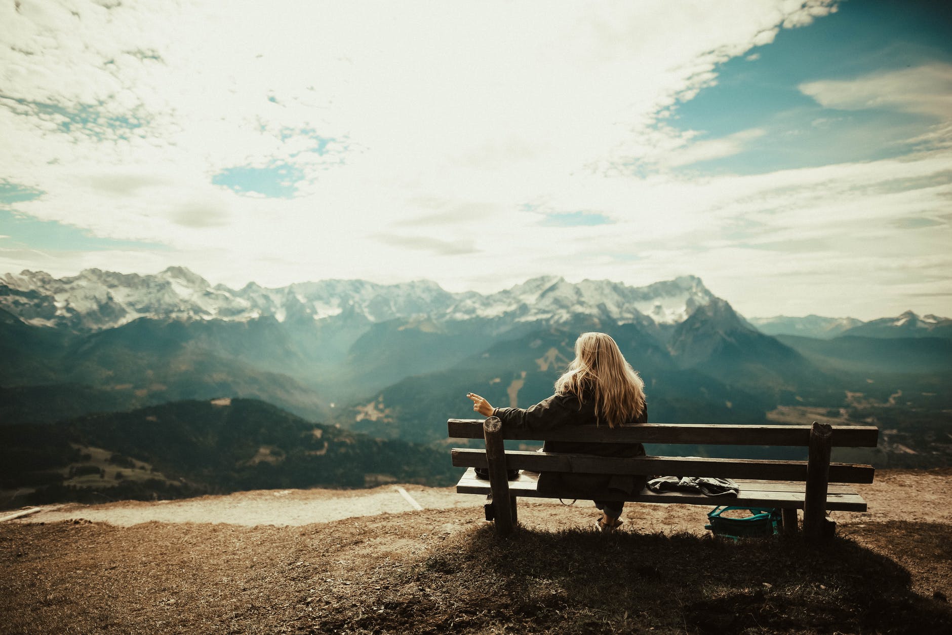 woman sitting on bench